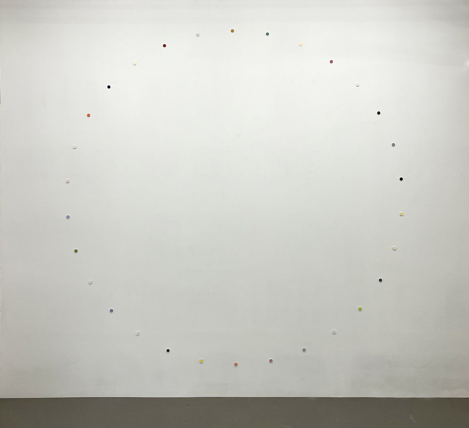 a small wheel, pigment, casein on aluminum, 22 x 6 mm (each), 250 x 250 cm (overall), 2025 <br><br>