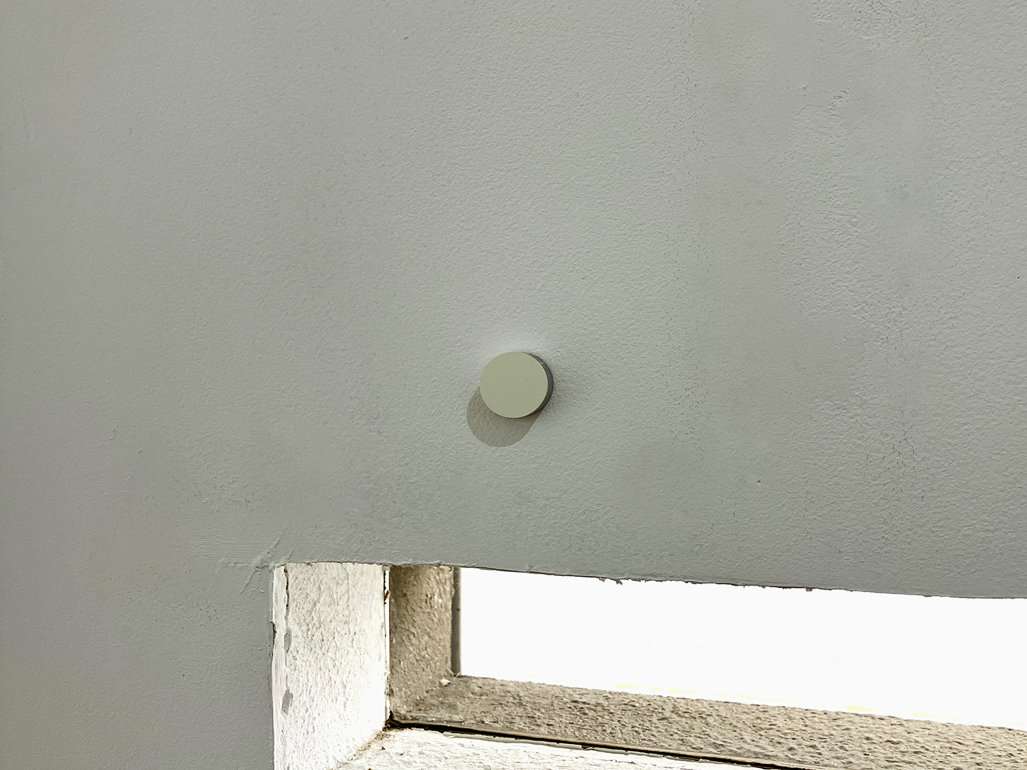 White, pigment, casein on alumium, diameter 22 mm width 6 mm, 2007<br><br>