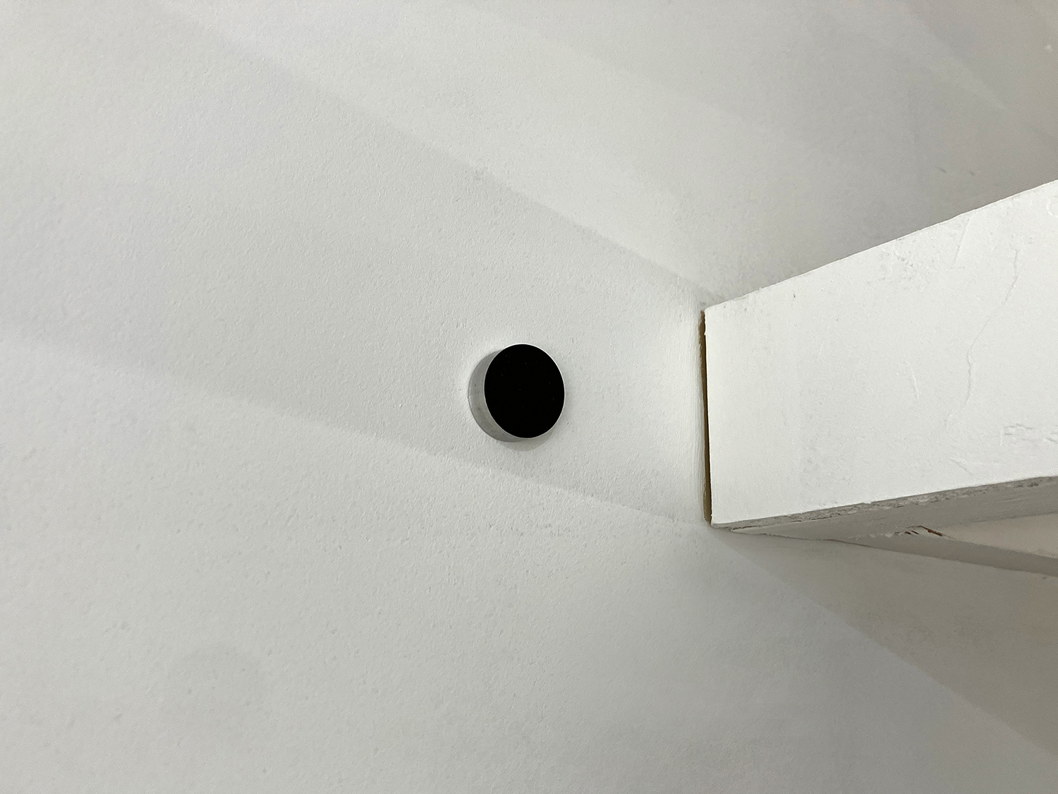 Black, pigment, casein on alumium, diameter 22 mm width 6 mm, 2007<br><br>
