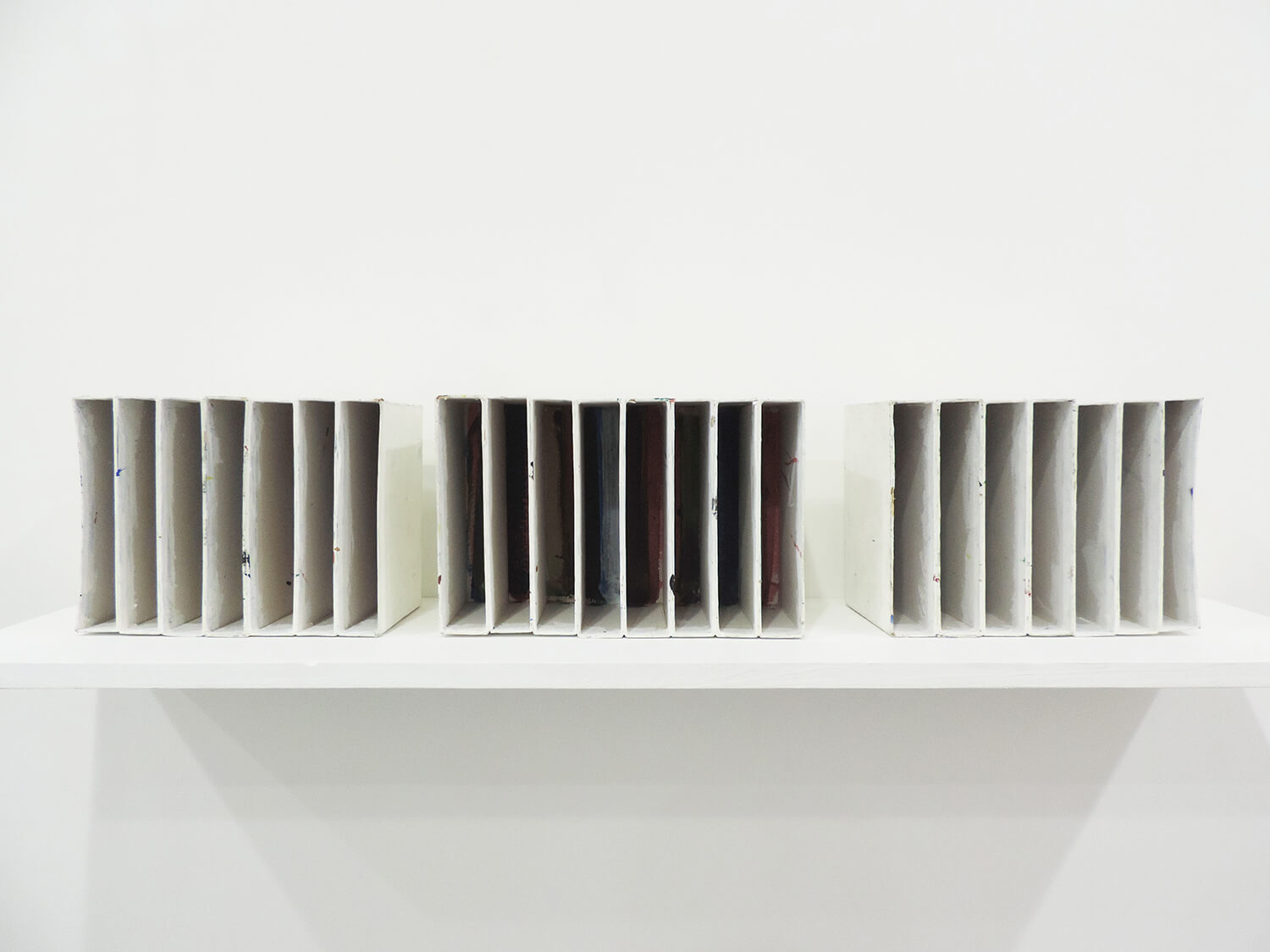 <b>Untitled</b><br>Acrylic on bookcases　（24.5, 26, 25.6）  x 18.7 x 13.5 cm　2010-12